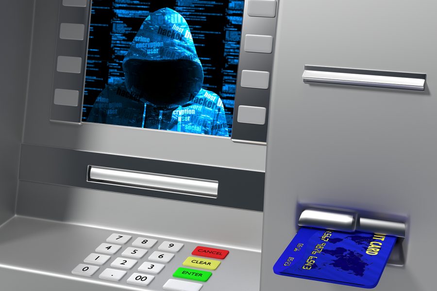 Un hacker en la pantalla de un cajero automático
