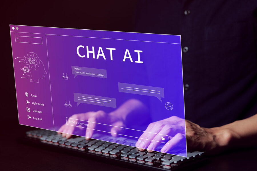 un hombre utiliza un servicio de chat basado en inteligencia artificial con su ordenador