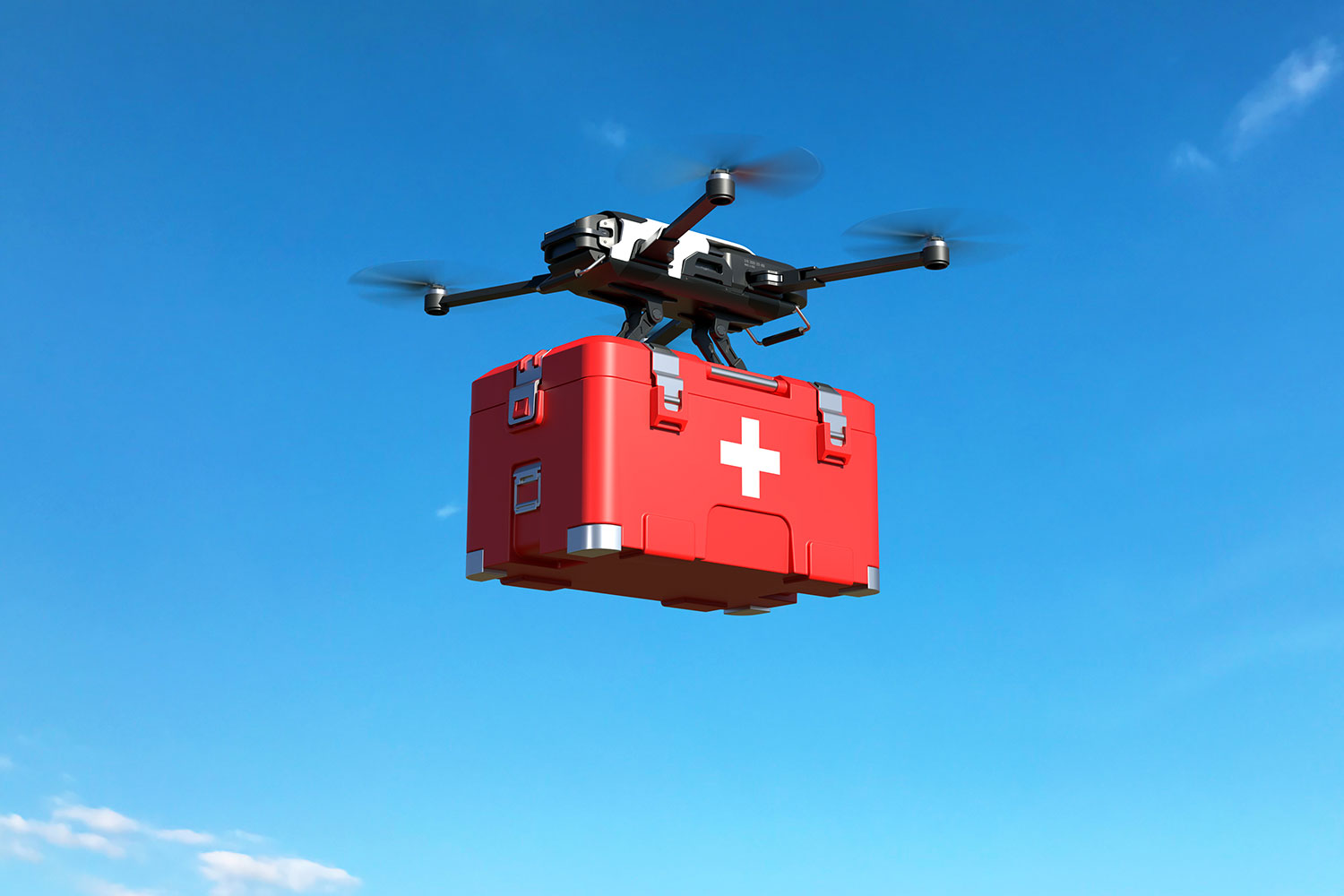 un dron en vuelo transporta una caja de primeros auxilios